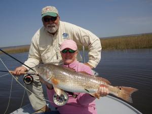 Susan and Scud - 13-pound Redfish on fly